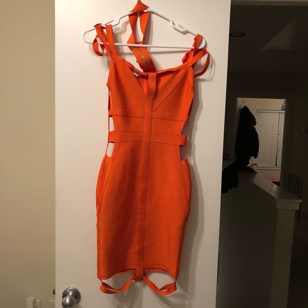 Mistress rocks orange club dress